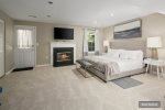 Master suite delivers a king-sized, memory foam mattress -basement floor-